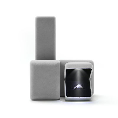 Caixa de jóias de luxo com luz LED e logotipo Hanhong personalizado em material de veludo