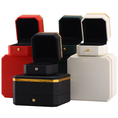 comprar Caixa de embalagem de jóias em couro PU octogonal de várias cores com decoração de corte de ouro online manufacture