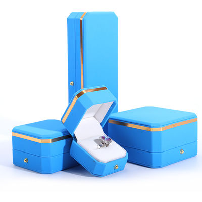comprar Caixa de jóias de embrulho de presente de couro PU azul para logotipo personalizado de botão de metal octogonal Hanhong online manufacture