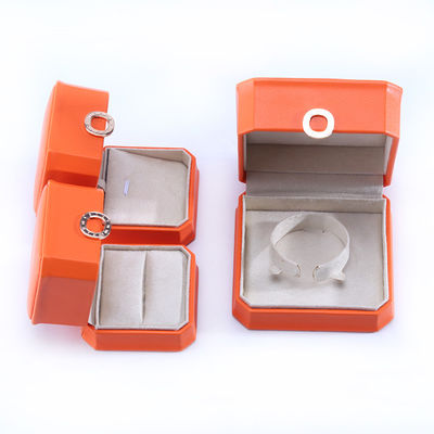 Caixa de embalagem de joias de couro PU laranja quadrada para pulseira de colarinho e anel de casamento