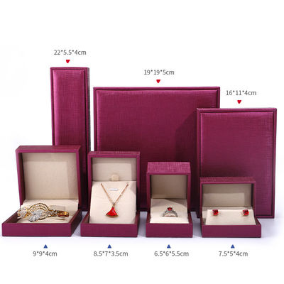 China fabricação atacado Luxury Jewelry Caixa de embalagem Custom high end Necklace Bracelet Orifício Anel Embalagem rosa Vermelho Pu Couro Caixa de jóias com logotipo