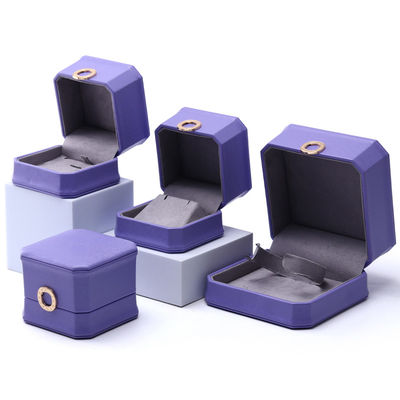 comprar Caixinha de jóias de couro PU octogonal roxo cativante para pendente de orelhas online manufacture