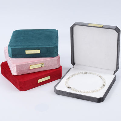 comprar Caixa de armazenamento de colar de pérola de veludo de cores múltiplas com escudo de ouro online manufacture