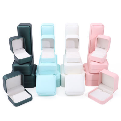 comprar Caixa de armazenamento de joias de couro PU de telhado convexo multicolor online manufacture