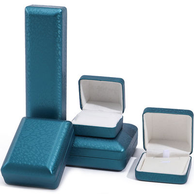 comprar Caixa de jóias de couro PU de grão de neve azul, caixa de presente OEM online manufacture