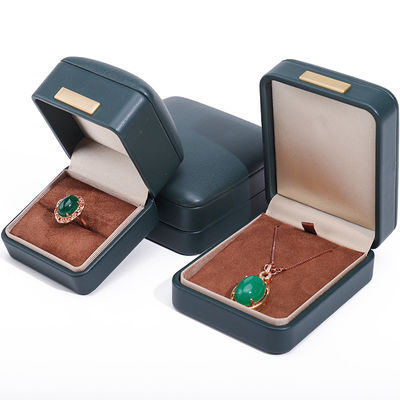 Caixa de jóias de luxo com ornamentação de barras de ouro