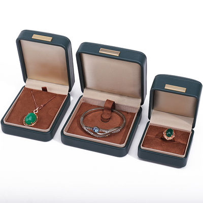 Caixa de jóias de luxo com ornamentação de barras de ouro