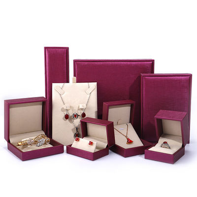 China fabricação atacado Luxury Jewelry Caixa de embalagem Custom high end Necklace Bracelet Orifício Anel Embalagem rosa Vermelho Pu Couro Caixa de jóias com logotipo